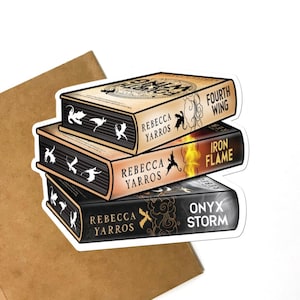 May include: A sticker featuring three stacked books with the titles "Fourth Wing", "Iron Flame", and "Onyx Storm". The books have a tan, orange, and black color scheme, with the author's name, Rebecca Yarros, printed on the spines.