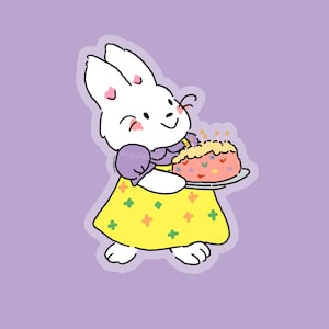 May include: A cartoon illustration of a white rabbit holding a cake on a plate. The rabbit wears a yellow dress with colorful flower accents and a purple sleeve. The cake is pink with colorful star and heart decorations and lit candles.