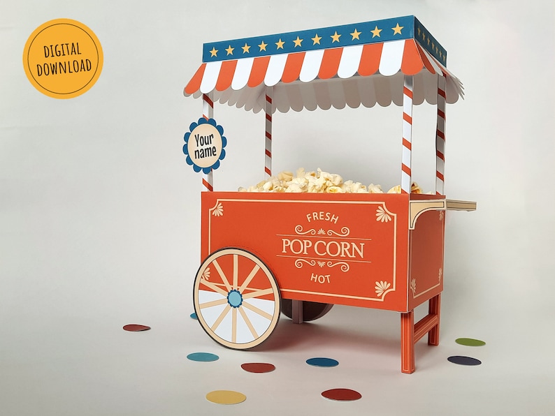 May include: Red and white popcorn cart with a striped awning and a sign that says "Fresh Pop Corn Hot". The cart has a blue and white wheel and is filled with popcorn.