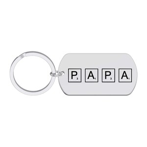 May include: Silver keychain with a rectangular tag that says "PAPA" with the letters represented as chemical elements. The letters are in black and the numbers are in subscript.