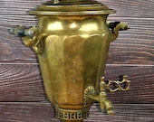 Vintage Old Soviet Samovar on the wood of his imperial majesty the heir to Batashev