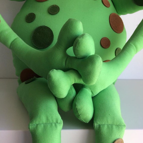 green frog doll