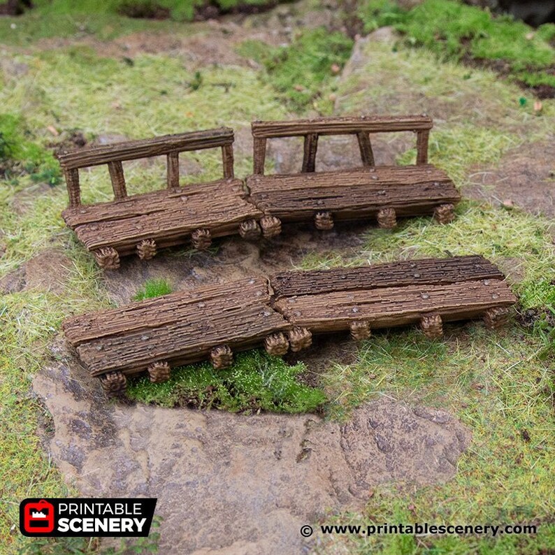May include: A set of three wooden bridges with a rustic, weathered look. The bridges are made of planks and have small, wooden supports. The bridges are perfect for adding a touch of realism to your miniature tabletop games or dioramas.