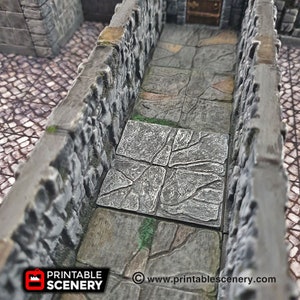 May include: A close-up of a stone walkway with a stone wall on either side. The walkway is made of square tiles with a rough, textured surface. The walls are made of stacked stones with a rough, uneven surface. The walkway is lit by a soft, natural light. The text "Printable Scenery" and "www.printablescenery.com" is visible in the bottom right corner of the image.