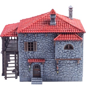 May include: A miniature stone house with a red tiled roof, a wooden balcony, and a ladder leading up to it. The house has a door, two windows, and a small arched window.