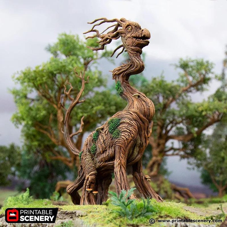 May include: A wooden sculpture of a mythical creature with a long neck, a head with a beak, and a body covered in bark and moss. The creature has four legs and is standing on a green surface.