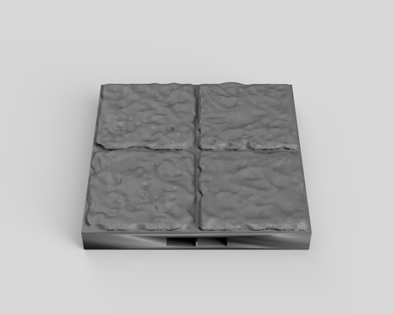 May include: A set of four gray stone tiles with a textured surface. The tiles are arranged in a 2x2 grid and are mounted on a black base.