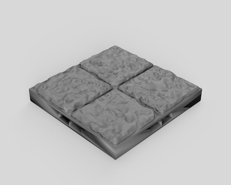 May include: A set of four gray stone tiles with a textured surface. The tiles are arranged in a square pattern and have a slightly raised edge.
