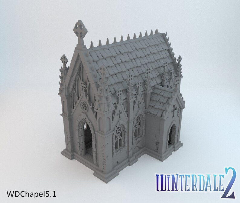 May include: A gray 3D printed model of a gothic chapel with a detailed roof, windows, and a cross on top. The model is labeled "WDCchapel5.1" and "WINTERDALE 2".
