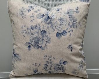 Faded blue roses on linen pillow covers