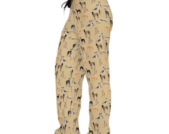 May include: Beige pajama pants with a pattern of Italian Greyhound dogs in various poses. The dogs are in shades of brown, black, and white.