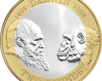 May include: A silver two pound coin featuring a profile of Charles Darwin and a chimpanzee, with the text "1809. DARWIN. 2009" around the rim.