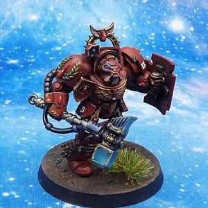 Terminator veterano del capítulo Blood Angels wh40k con escudo de poder y martillo de poder. Pintado con un estándar muy alto.