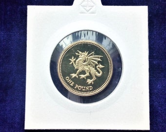 Moeda de uma libra esterlina (antiga) com o dragão de Gales. Sem circulação, PROVA.