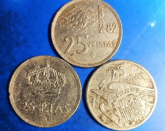 ユーロ導入前のスペインの25ペセタ3枚。デザインが異なる。流通して