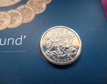 Moeda de uma libra esterlina da Casa da Moeda Real de 2016, "A Última Rodada", em estado de conservação brilhante não circulado.