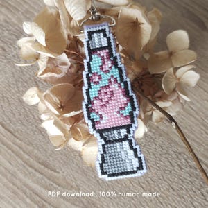 Ditto lava lamp - cross stitch pattern (pdf digital download) – cute keychain or patch with the pink copycat blob pokemon in a retro light