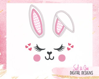 May include: A white bunny face with pink ears, closed eyes, a black nose, and a small smile. There are pink hearts around the eyes. The text "Sid & Bee DIGITAL DESIGNS" is at the bottom of the image.