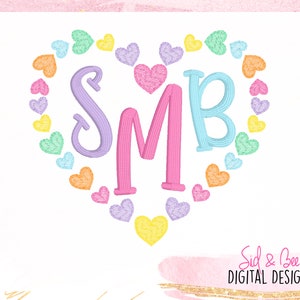 May include: A heart-shaped design with a rainbow of colorful hearts surrounding the letters SMB. The letters are in a cursive font and are pink, purple, and blue.