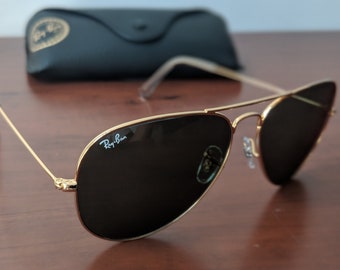 ray ban aviator sunglasses gold frame black lenses