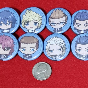 May include: Eight blue and white round pinback buttons featuring different cartoon characters from the Final Fantasy video game series. The characters are depicted in a chibi style with large heads and small bodies. The buttons are arranged in two rows of four, with a silver US quarter dollar coin in the center for scale.