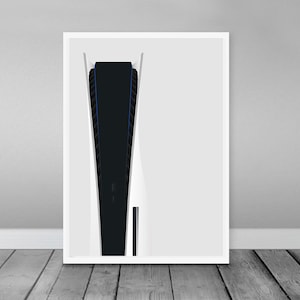 Könnte beinhalten: Ein weiß gerahmter Druck eines minimalistischen Designs mit einer schwarzen und blauen PlayStation 5 Konsole.