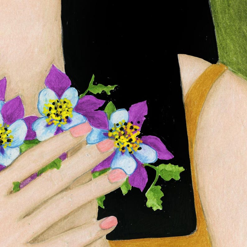 May include: A close-up of a person's hand holding a bouquet of purple and blue flowers with yellow centers. The flowers are against a black background.