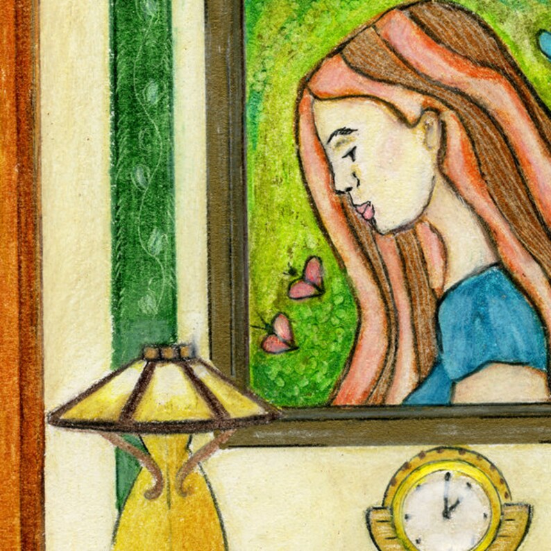 May include: A framed illustration of a woman with long red hair looking down. The woman is wearing a blue shirt and is framed against a green background with pink butterflies. A yellow lamp with a brown shade sits in the foreground. A gold clock with black hands is visible in the lower right corner.