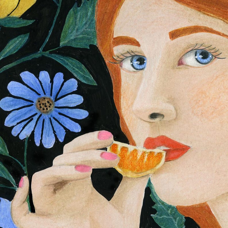 May include: A colored pencil illustration of a woman with red hair and blue eyes, holding a slice of orange to her lips. Pink nail polish and a blue flower are also visible. The background is black with green leaves.