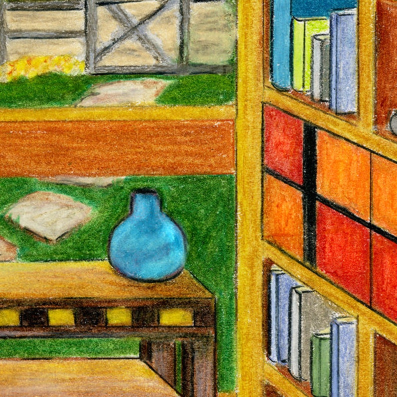 May include: A blue glass vase sits on a wooden table with a bookshelf in the background. The bookshelf has multiple shelves with books and colorful squares.