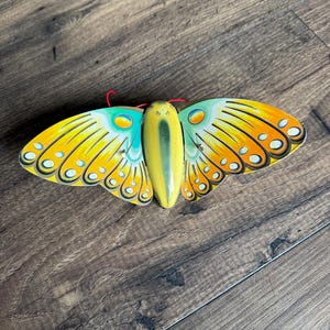 Vintage // Metal Lithographed Butterfly Push Toy on Wheels