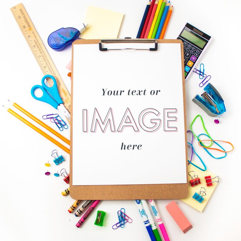 May include: A clipboard with a white sheet of paper that says "Your text or IMAGE here". The clipboard is surrounded by various school supplies, including crayons, pencils, a ruler, a calculator, scissors, and a stapler.