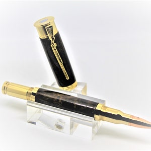 Over & Under Shotgun styled pen in brass with rose gold tip, made with South African Blackwood