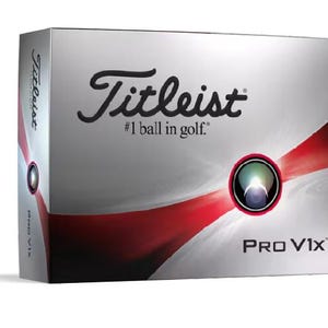 May include: A silver and red golf ball box with the Titleist logo and the text "#1 ball in golf." The box also features a red and white swirl design and the text "Pro V1x."