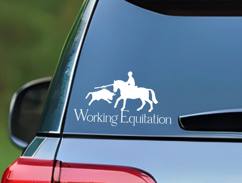 May include: White silhouette decal of a rider on a horse with a bull, with the text "Working Equitation" below.