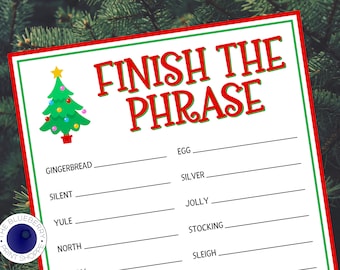 May include: A printable Christmas game with the title "Finish the Phrase". The game features a list of Christmas-themed words with blanks for players to fill in the missing words. The words include "Gingerbread", "Silent", "Yule", "North", "Egg", "Silver", "Jolly", "Stocking", and "Sleigh".