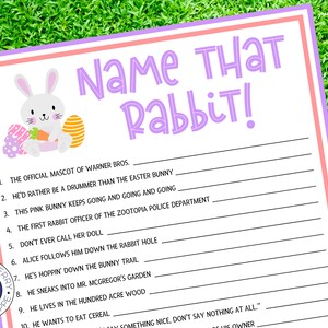 May include: A printable Easter game sheet titled "Name That Rabbit!" features a white rabbit holding a carrot, Easter eggs, and purple text. The game is set against a green grass background.
