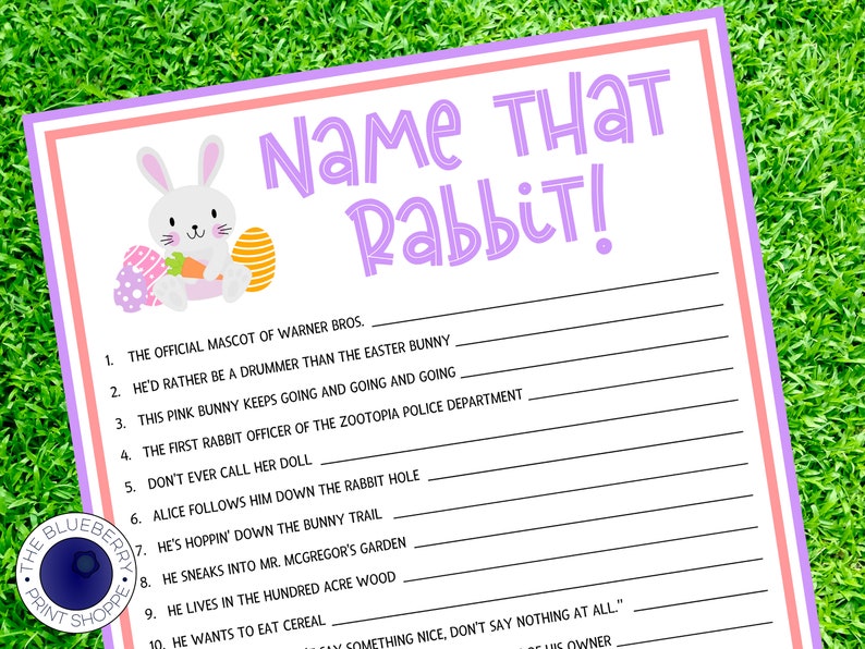 May include: A printable Easter game sheet titled "Name That Rabbit!" features a white rabbit holding a carrot, Easter eggs, and purple text. The game is set against a green grass background.