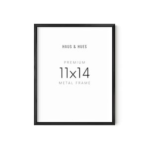 May include: Black metal picture frame with the text "HAUS & HUES" and "PREMIUM 11x14 METAL FRAME" printed on a white background.