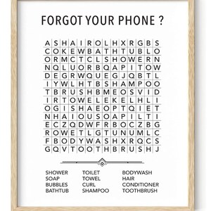 May include: A black and white word search puzzle with the words "Forgot your phone?" at the top. The puzzle includes words related to bathroom items, such as shower, soap, towel, shampoo, and toothbrush.