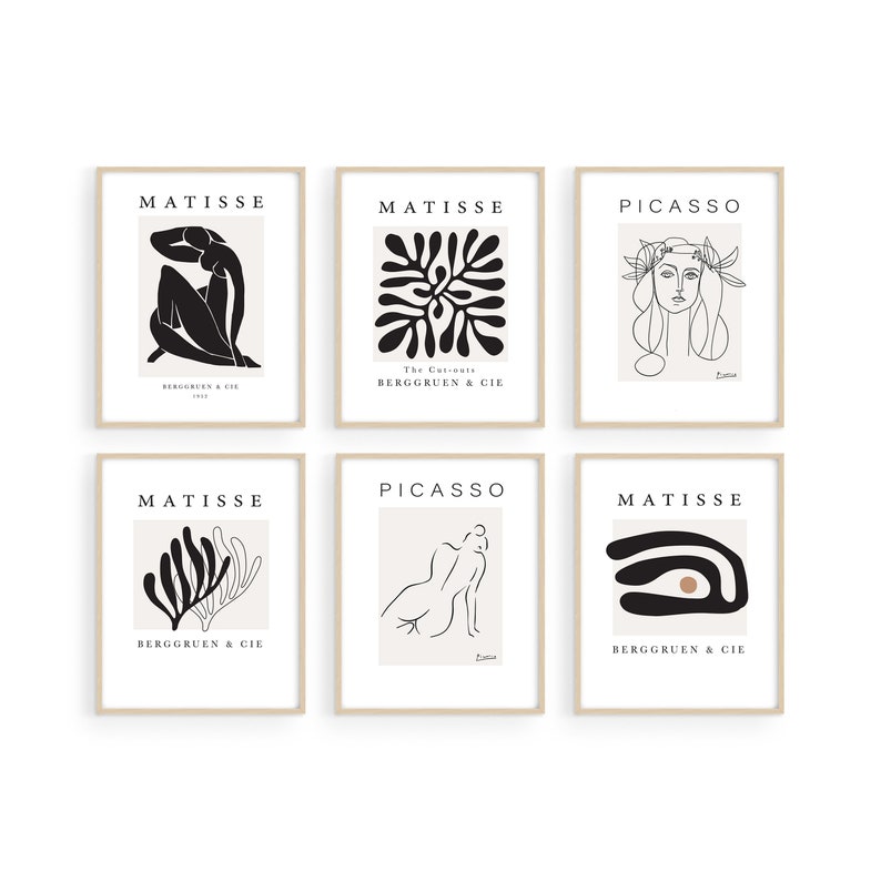 May include: Six minimalist art prints featuring black and white line drawings by Matisse and Picasso. The prints are framed in a light wood frame and have a white background. The prints include a seated figure, a floral design, a woman's head, a reclining figure, a stylized branch, and an abstract eye.