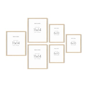 May include: Five natural oak picture frames in various sizes. The frames are arranged in a staggered pattern on a white background. The frames are labeled with the text "HAUS & HUES" and the size of the frame, such as "11x14" or "8x10".