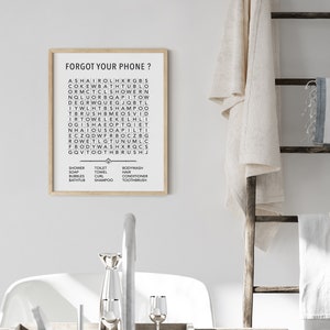 May include: A black and white printable bathroom wall art poster with the text "Forgot your phone?" and a word search puzzle with the words "shower, soap, bubbles, bathtub, toilet, towel, curl, shampoo, bodywash, hair, conditioner, toothbrush".