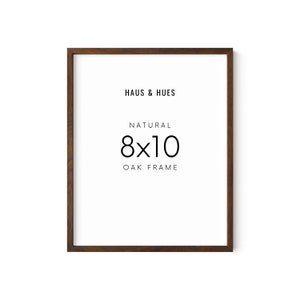 May include: A natural oak frame for an 8x10 inch photo or print. The frame is made by Haus & Hues.
