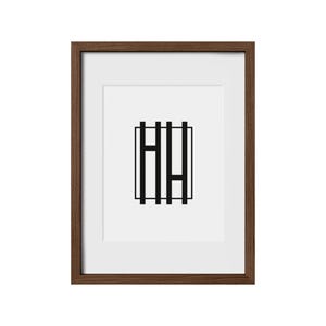 May include: A framed print with a black and white geometric design of the letters "HH" inside a square.