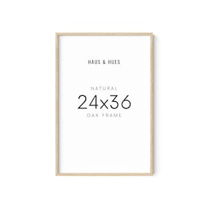 Op de afbeelding: Natuurlijke eikenhouten lijst voor een print van 61x91 cm. De lijst is gemaakt door Haus & Hues.