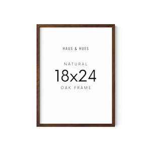 May include: A natural oak frame for a 18x24 inch print or photo. The frame is made by Haus & Hues.