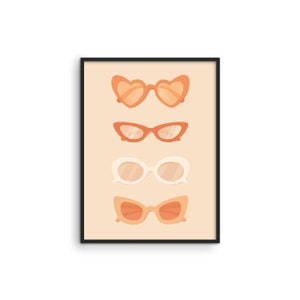 May include: A digital illustration of four pairs of sunglasses in different styles. The sunglasses are all in shades of orange and white, and they are arranged vertically on a beige background. The sunglasses are framed by a black border.