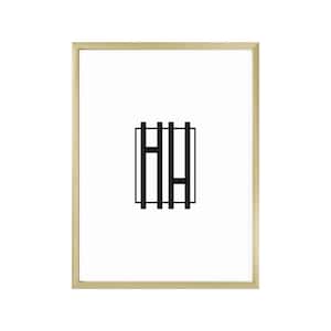 May include: A gold-colored picture frame with a black and white geometric design inside. The design is a series of vertical lines that form the letter "H".