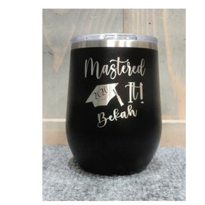 May include: Black stainless steel wine tumbler with a silver inscription that reads "Mastered It! 2020 Bekah".